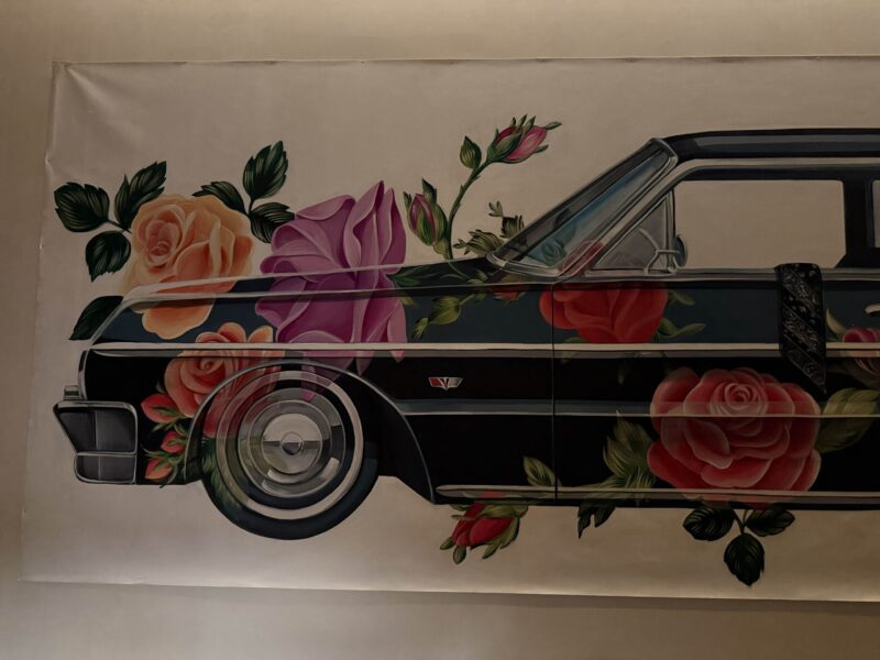Chicano lowrider mural of Chevrolet Bel Air with roses on North Palm Canyon Drive, Palm Springs, 2025