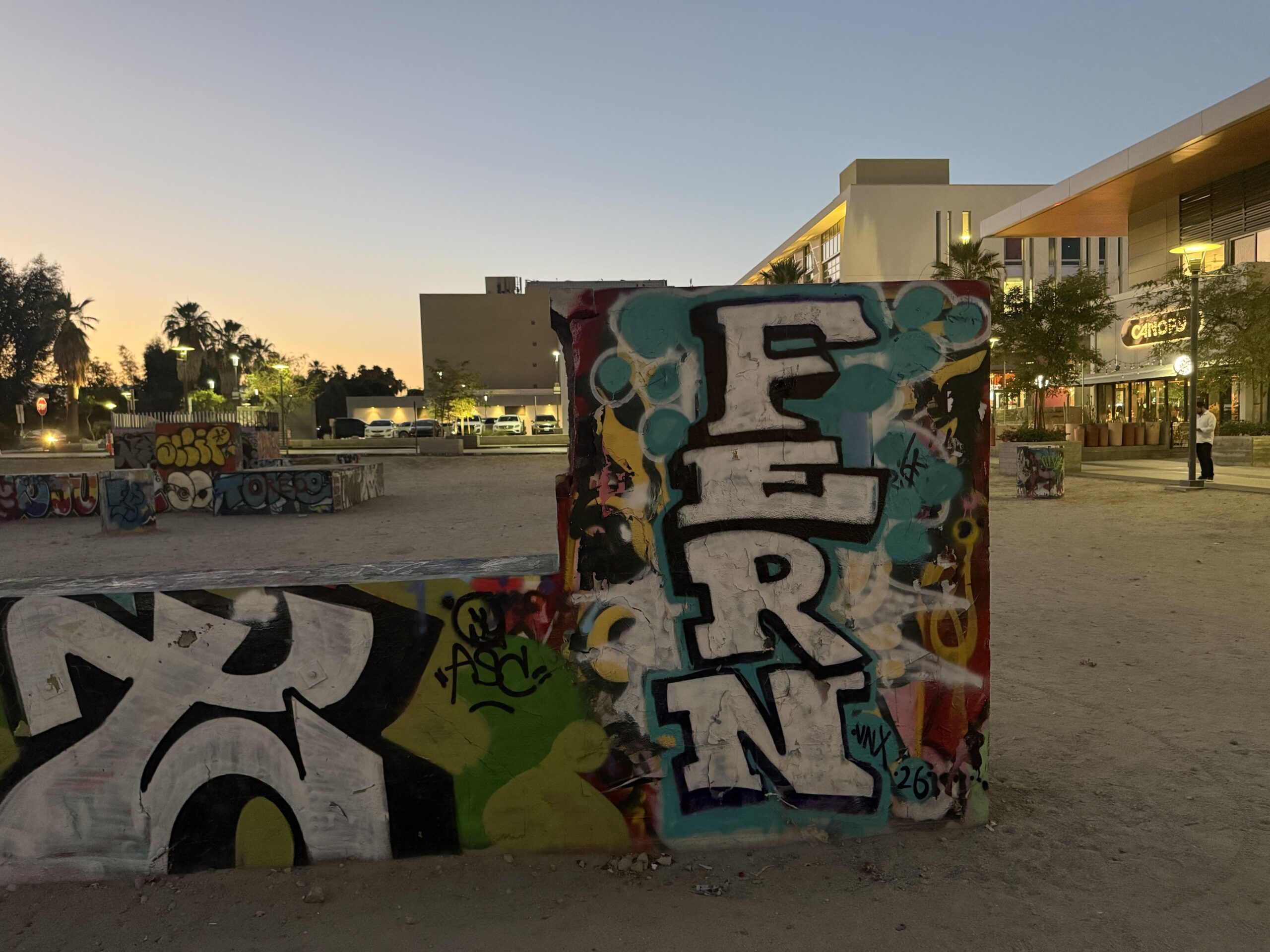 Block letter graffiti piece by FERN on concrete skatepark block, Museum Way, Palm Springs, 2026