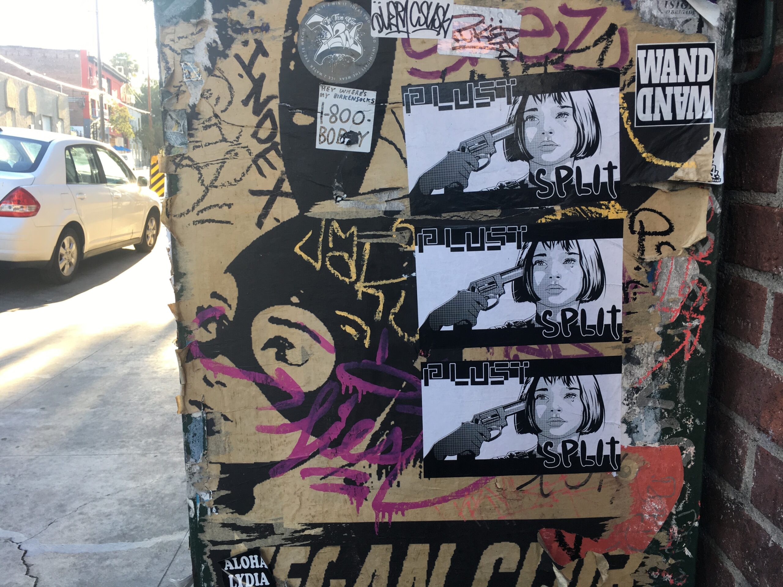 PLUST halftone paste-up posters on utility pole, Traction Avenue, Los Angeles, 2016
